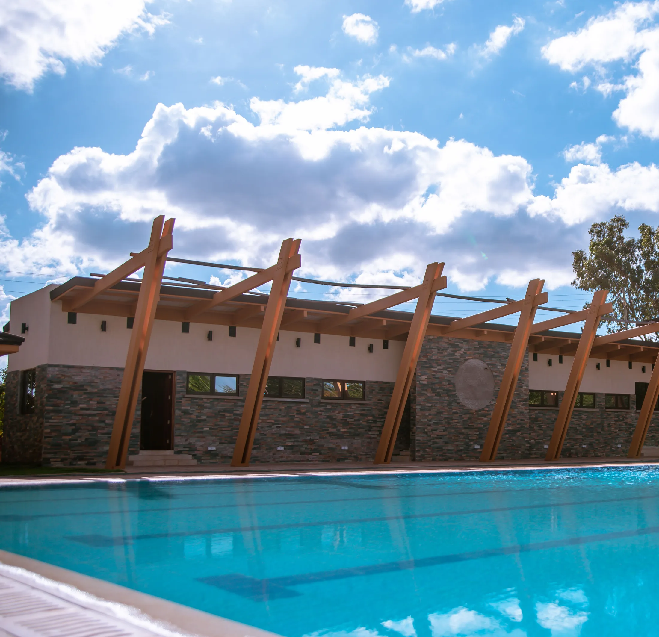 Stone-edged pool detail at Acacia Woods